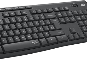 Teclado negro Logitech MK295 y ratón sobre escritorio de madera junto a una planta y monitor